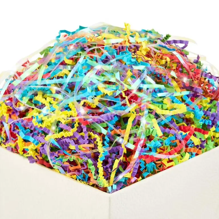 Shredded tissue paper gift packaging